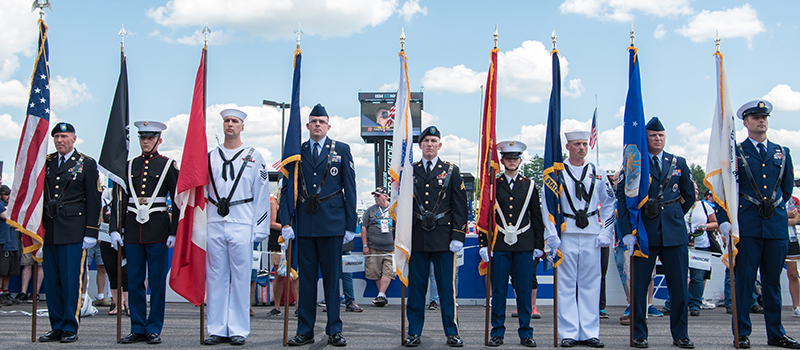 Military members during pre-race ceremonies at New Hampshire Motor Speedway in July 2017